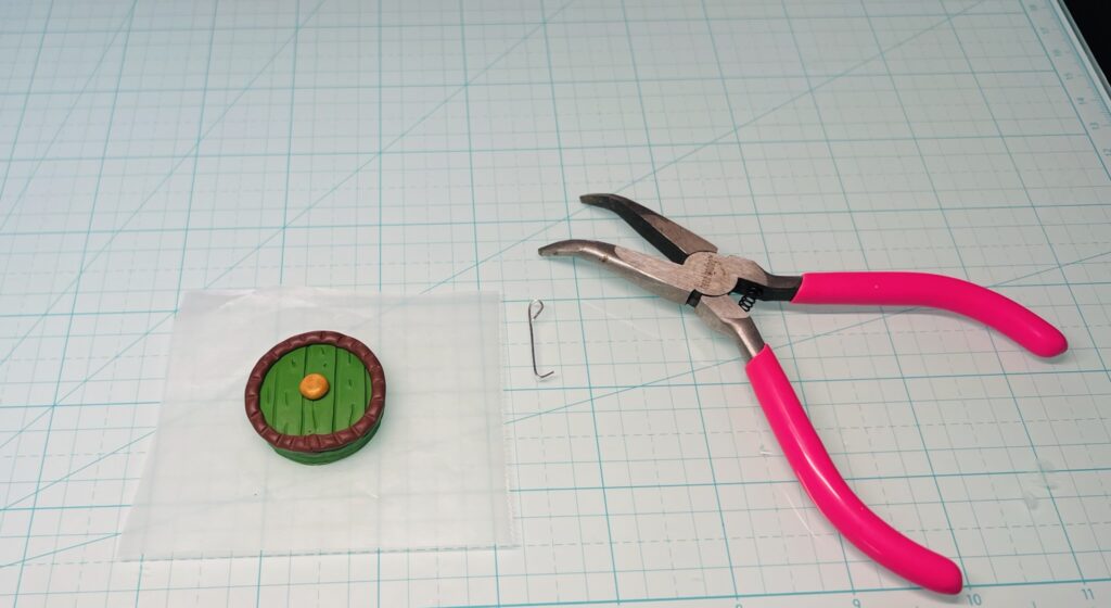 jewelry pliers with diy eye pin made from wire and polymer clay pendant