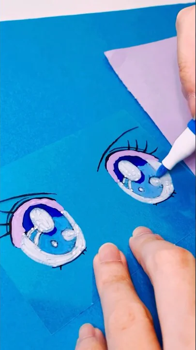 hands drawing bright sparkling anime eyes