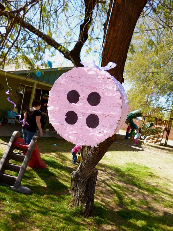 DIY Button pinata hanging from tree